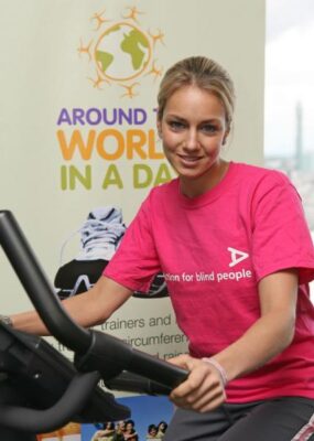 Lady Isabella Hervey on an exercise bike