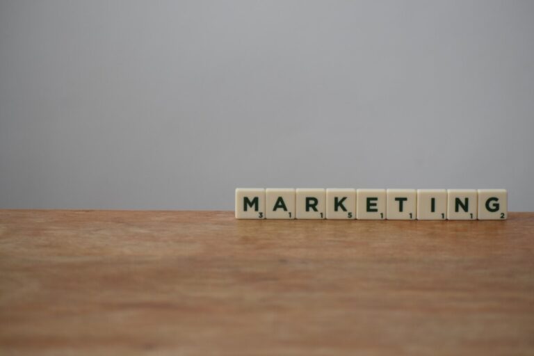 'Marketing' in Scrabble tiles on a table - photo: Pexels.com