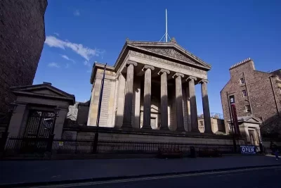 Surgeon's Quarter - collonaded building against a clear blue sky