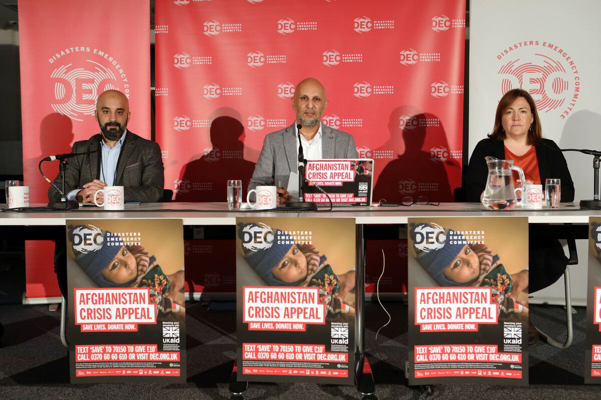 The DEC launches the Afghanistan Crisis Appeal. L-R Tufail Hussain (Islamic Relief), Saleh Saeed (DEC) and Maryann Home (Red Cross). London, 14/12/21. Photo: Andy Hall/DEC