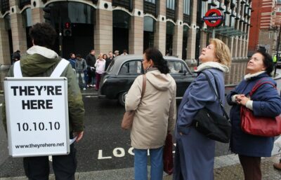 Sandwich board promotes Onekind's viral campaign 'They're Here'