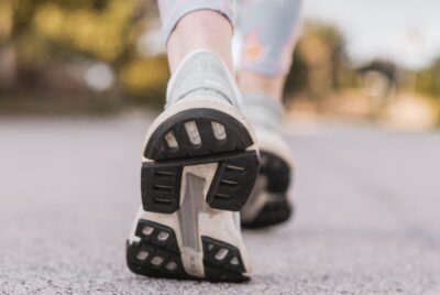 a close up of a woman's trainers