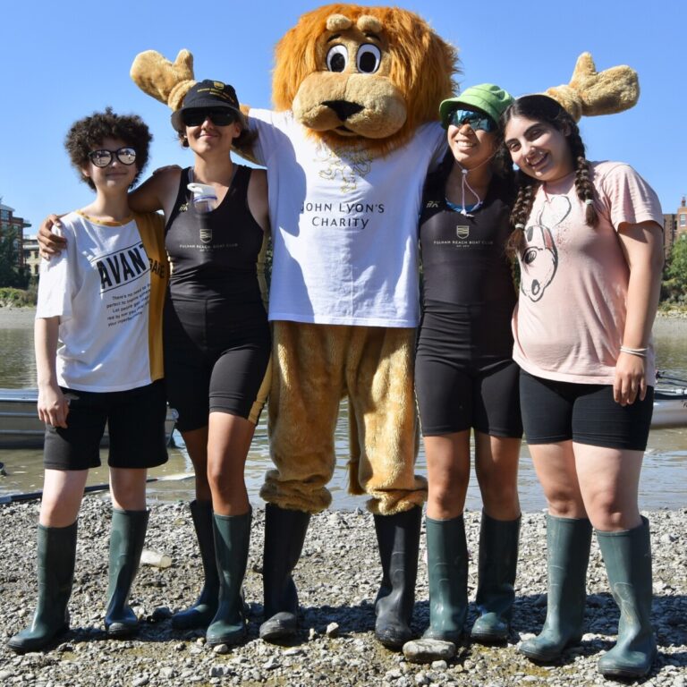 John the Lyon with children in wellington boots. Photo: Tim Koch