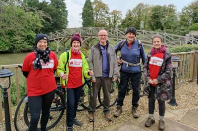 Tumour survivor Christine Garratt on the October Brain Tumour Charity Twilight Walk with other walkers