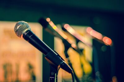 A line of microphones. by Rudy and Peter Skitterians on Pixabay