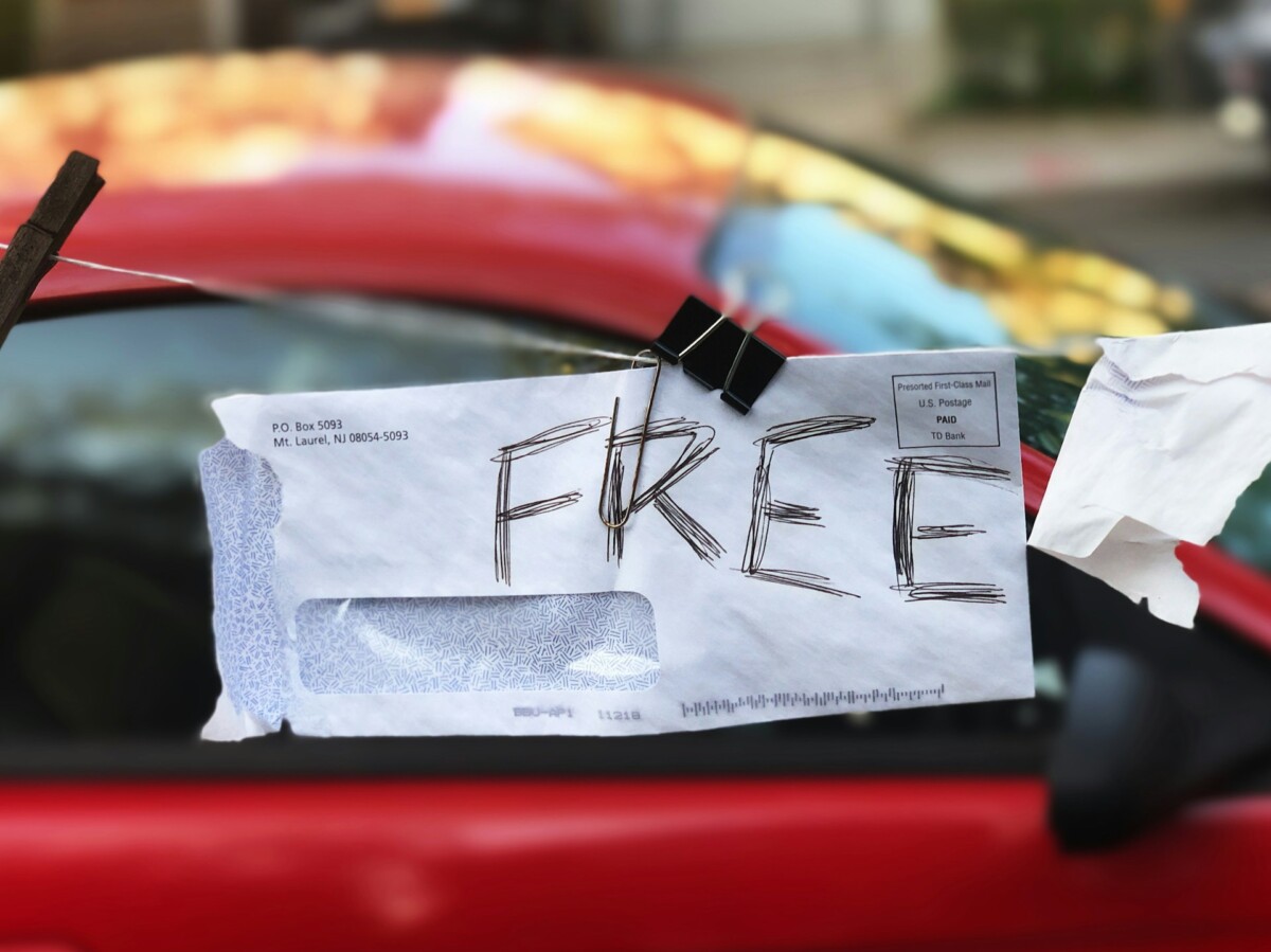 'FREE' scribbled on a white envelope.