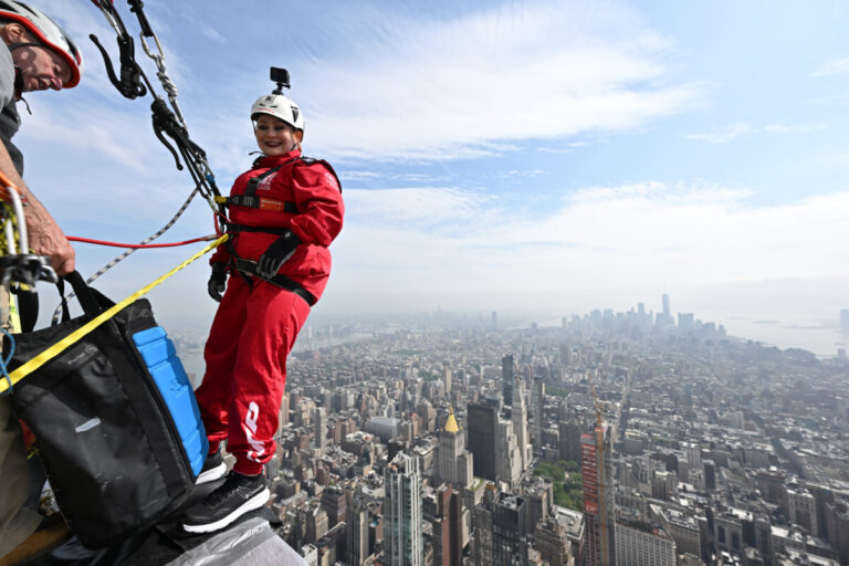 Stepping off the top of the Empire State Building with New York far below.