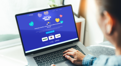 The Great Gift Aid Hunt 2026 on a laptop, viewed over someone's shoulder